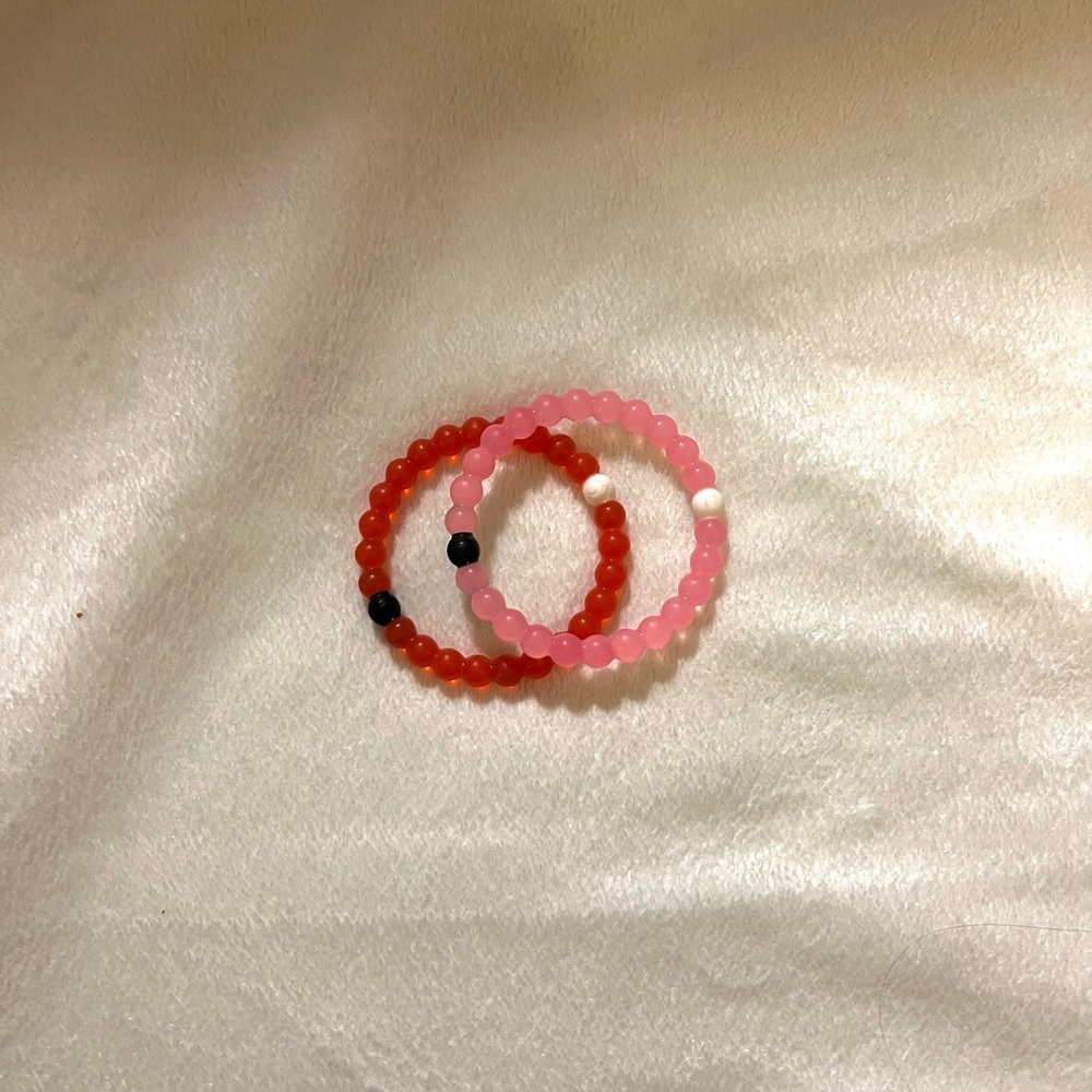 Two Lokai bracelets